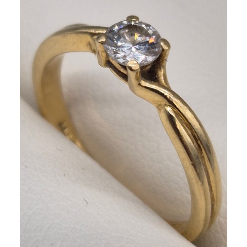 52 - 18ct yellow gold and diamond solitaire ring. Single round cut diamond. 0.21cts. 2.63grams. Ring size... 