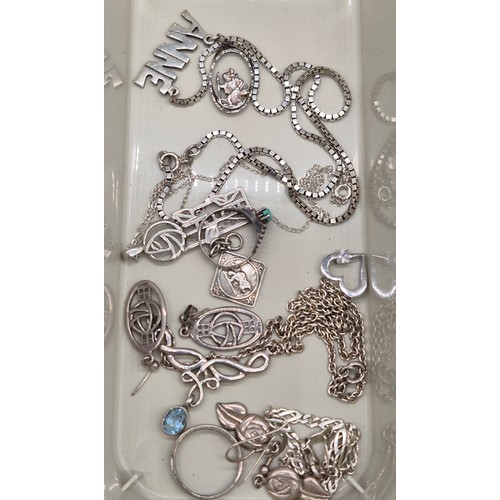58 - Two tubs of silver jewellery; St Christopher pendants, Rings, Charles Rennie Mackintosh design penda... 