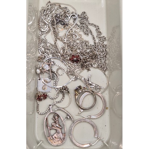 58 - Two tubs of silver jewellery; St Christopher pendants, Rings, Charles Rennie Mackintosh design penda... 