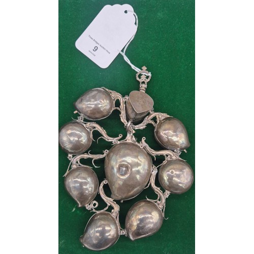 9 - 19th century Indian White Metal Pandan or Kumkum holder. With nine compartments linked together and ... 