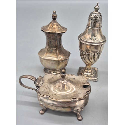 12 - A Collection of silver condiment pots and cruets. Pair of ornate French condiment pots- one glass in... 