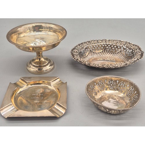 11 - Four items of silver: London silver pieced dish, Bham silver ashtray, small Sheffield silver pierced... 