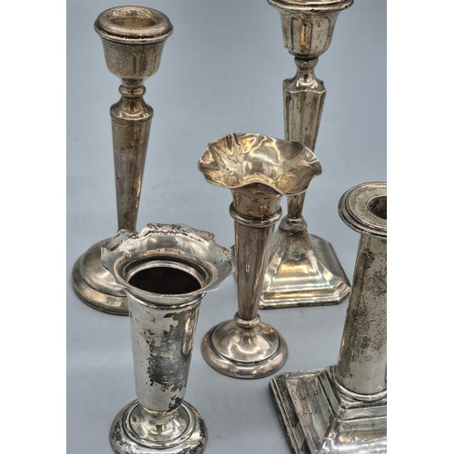 13 - A Collection of weighted silver candle sticks and bud vases; Includes Pair of Birmingham silver cand... 