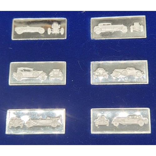 7 - A Collection of 25 solid silver car ingots by Franklin Mint. 68grams.