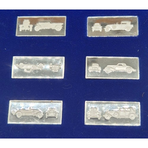7 - A Collection of 25 solid silver car ingots by Franklin Mint. 68grams.