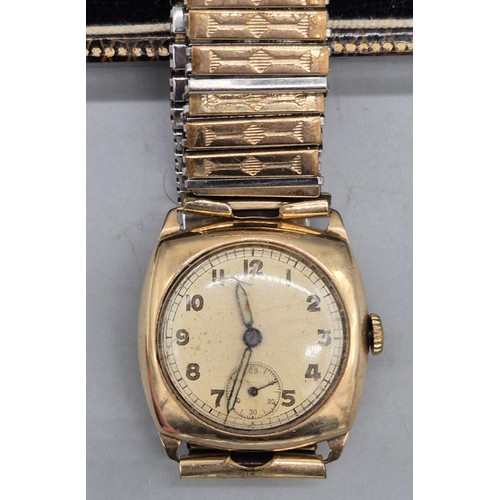 19 - 9ct yellow gold cased watch. Comes with elasticated plated strap. In a running condition. Damage to ... 