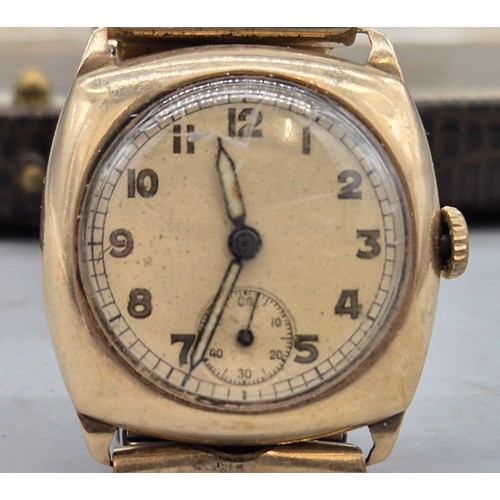 19 - 9ct yellow gold cased watch. Comes with elasticated plated strap. In a running condition. Damage to ... 