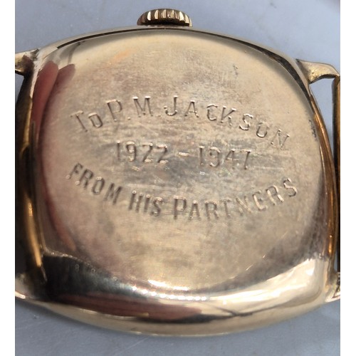 19 - 9ct yellow gold cased watch. Comes with elasticated plated strap. In a running condition. Damage to ... 