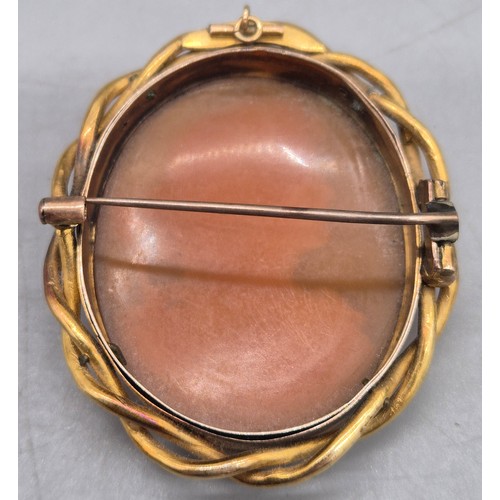 33 - Victorian gold and carved cameo brooch. 20.54grams.