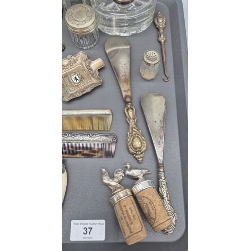 37 - A Tray of silver and silver plated items; Silver handled items, Silver topped ink well pot, Silver p... 