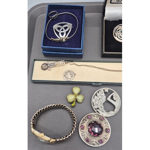 36 - A Collection of mixed jewellery; 925 silver Celtic design brooch, Silver McIntosh design jewellery, ... 