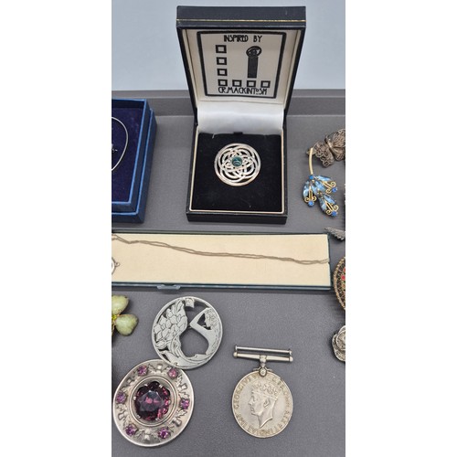 36 - A Collection of mixed jewellery; 925 silver Celtic design brooch, Silver McIntosh design jewellery, ... 