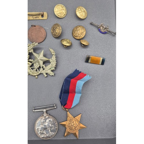 23 - A Selection of WWI & WW2 Medals, buttons and cap badges. Silver and enamel Scottish Rifle brooch. WW... 