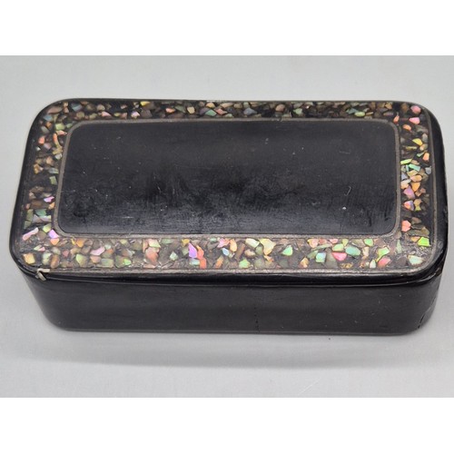 26 - Three 19th century snuff boxes. Two inlaid and one the form of a shoe.