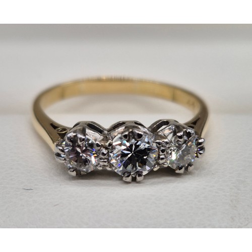 41 - 18ct yellow gold and diamond stone ring. 0.60cts. Three round cut brilliant diamonds. 2.20Grams. Rin... 
