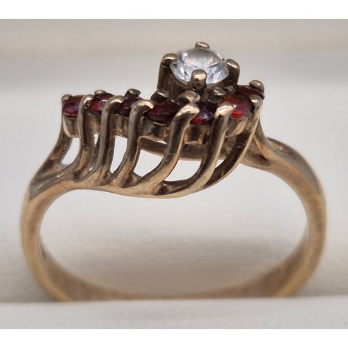 39 - 9ct yellow gold, garnet and CZ Stone ring. 2.77Grams. Ring size P.