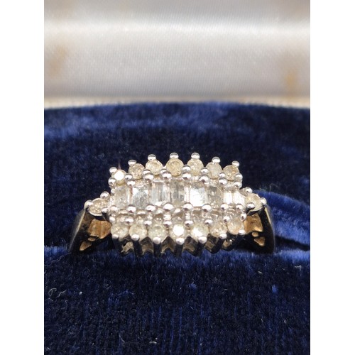 49 - 9ct yellow gold and diamond cluster ring. 0.50cts. Baguette and round cut diamonds. 3.78Grams. Ring ... 
