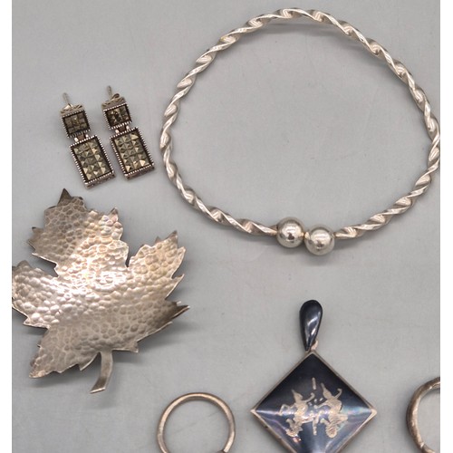 40 - A Selection of silver jewellery; Silver ladies watch, Two silver rings, Pair of silver 925 and marca... 