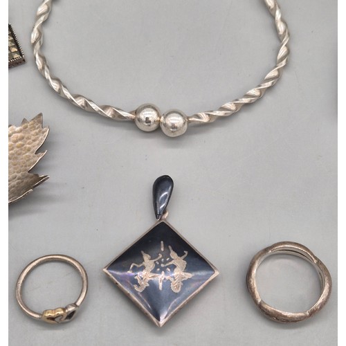 40 - A Selection of silver jewellery; Silver ladies watch, Two silver rings, Pair of silver 925 and marca... 