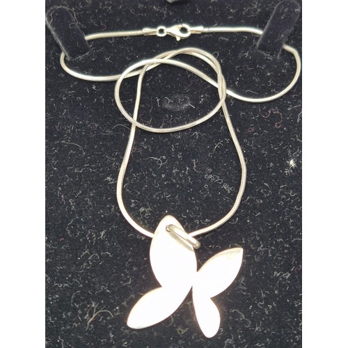 29 - Silver charm bracelet and charms. Together with silver chain and pendant.