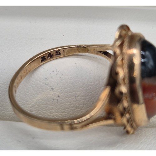56 - 9ct yellow gold and moss agate stone ring. 3.48grams. Ring size N.
