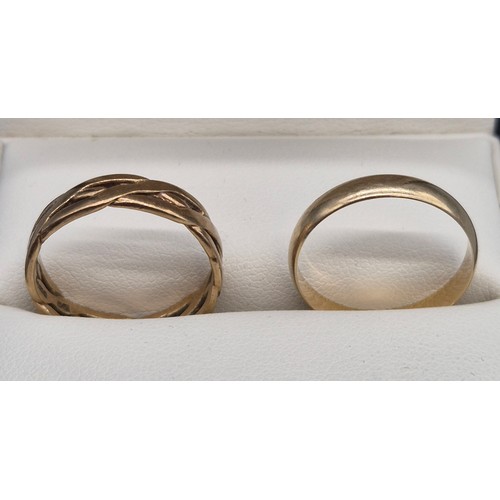 60 - Two 9ct yellow gold band rings; 9ct Celtic band ring-Ring size R. 9ct wedding band ring- ring size R... 