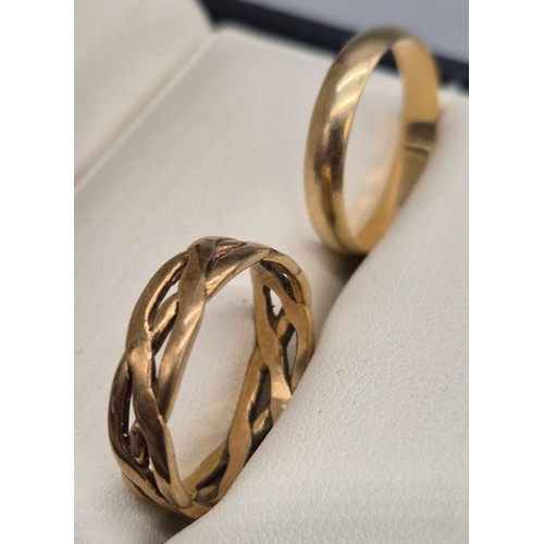 60 - Two 9ct yellow gold band rings; 9ct Celtic band ring-Ring size R. 9ct wedding band ring- ring size R... 