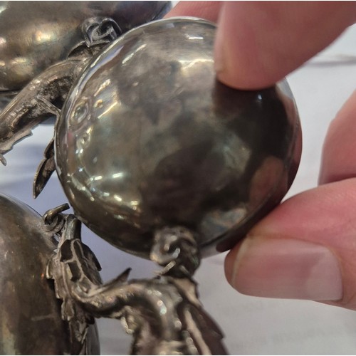 9 - 19th century Indian White Metal Pandan or Kumkum holder. With nine compartments linked together and ... 