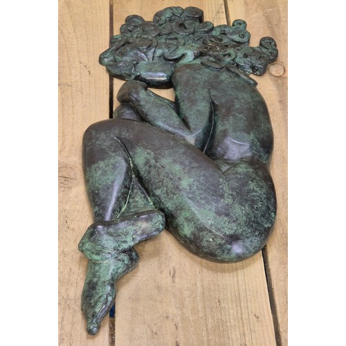 296 - Helen Dare
Bronze nude wall sculpture. 47cm length. Medusa style. Green patina finish.