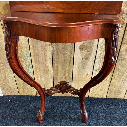 294 - Mahogany Serpentine console with Large narrow mirror.