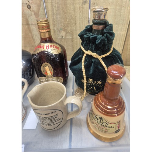 421 - Tray of collectable decanters and odds; Robbie Burns Scotch Whisky- full and sealed. Various decante... 