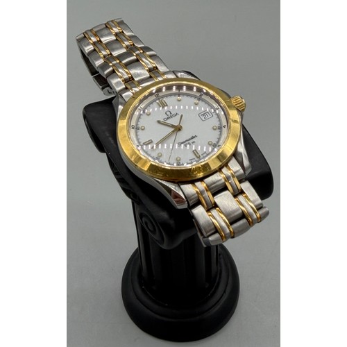 63 - Boxed Omega Seamaster 120M Mens watch in 18ct yellow gold and stainless steel. Comes with outer box.... 