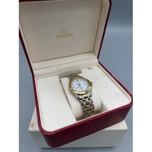 63 - Boxed Omega Seamaster 120M Mens watch in 18ct yellow gold and stainless steel. Comes with outer box.... 