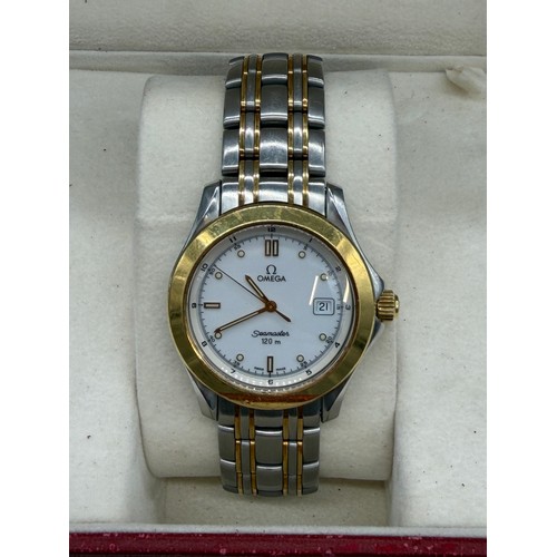 63 - Boxed Omega Seamaster 120M Mens watch in 18ct yellow gold and stainless steel. Comes with outer box.... 