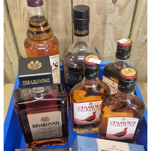 593 - Tray of spirit bottlings; Bell's 70cl whisky, three 350ml of Famous Grouse, The Glen Allachie Speysi... 