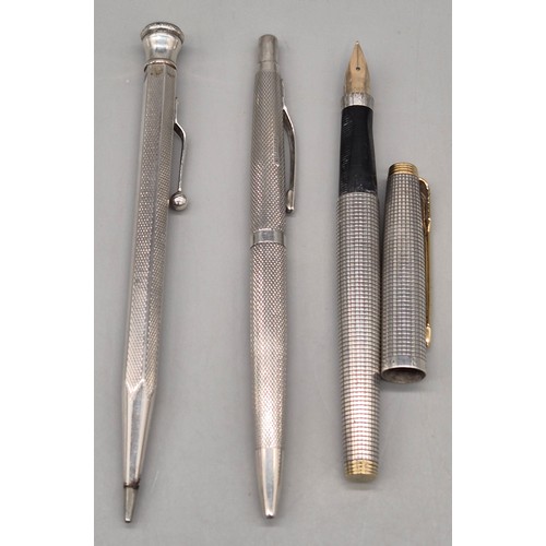 4 - Three Vintage Sterling silver pens; Sterling silver Parker fountain pen fitted with a 14ct gold nib,... 