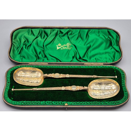 2 - Pair of Edwardian London Silver Gilt Anointing Spoons. Decoratively engraved and designed. Comes wit... 