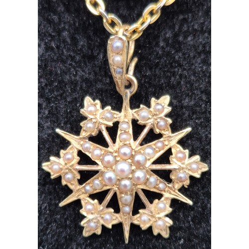 6 - Two gold Edwardian pendants; 9ct gold, seed pearl and green stone pendant with attached 9ct gold cha... 