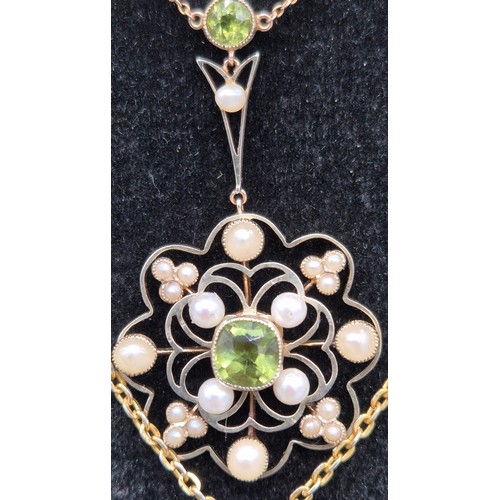 6 - Two gold Edwardian pendants; 9ct gold, seed pearl and green stone pendant with attached 9ct gold cha... 