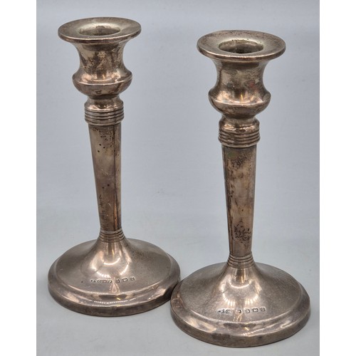 11 - Pair of weighted Birmingham silver candle sticks. Produced by Cornelius Desormeaux Saunders & James ... 
