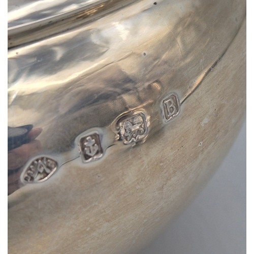 12 - Three piece Birmingham silver tea service. Tea pot, sugar and cream. Produced by Adie Brothers Ltd. ... 