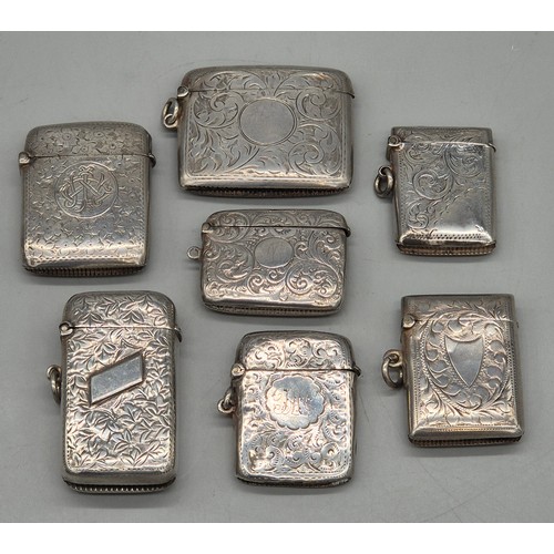 14 - A Collection of seven antique Birmingham silver ornate vesta cases. 167grams.