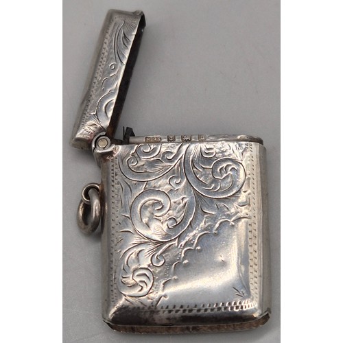 14 - A Collection of seven antique Birmingham silver ornate vesta cases. 167grams.