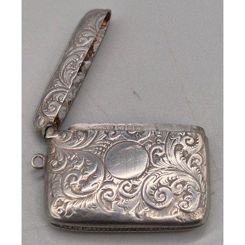 14 - A Collection of seven antique Birmingham silver ornate vesta cases. 167grams.