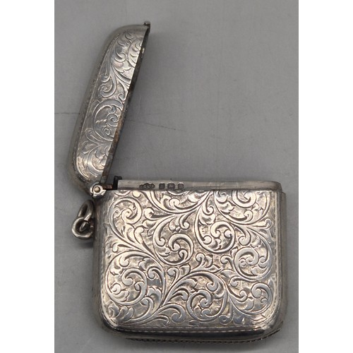 20 - A Collection of six Birmingham and one London Silver vesta cases. All ornately engraved and with som... 