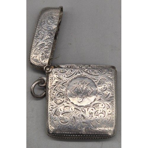 20 - A Collection of six Birmingham and one London Silver vesta cases. All ornately engraved and with som... 