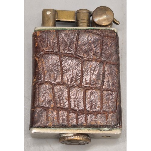 28 - A Collection of 5 various antique lighters; Silver 950 cased and engraved lighter. Cartouche engrave... 