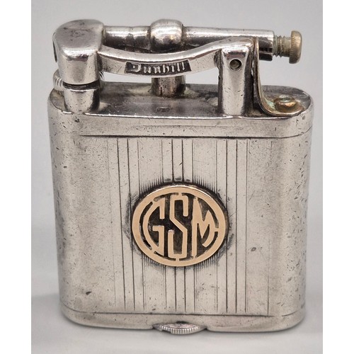28 - A Collection of 5 various antique lighters; Silver 950 cased and engraved lighter. Cartouche engrave... 
