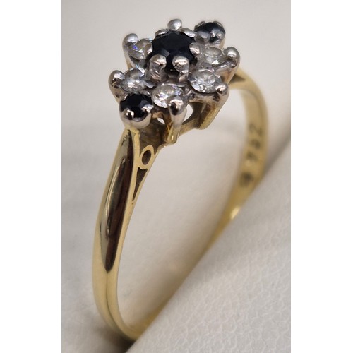 43 - 18ct yellow gold, blue topaz and diamond stone ring. 2.36grams. Ring size P.