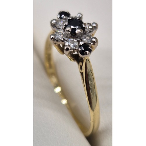 43 - 18ct yellow gold, blue topaz and diamond stone ring. 2.36grams. Ring size P.